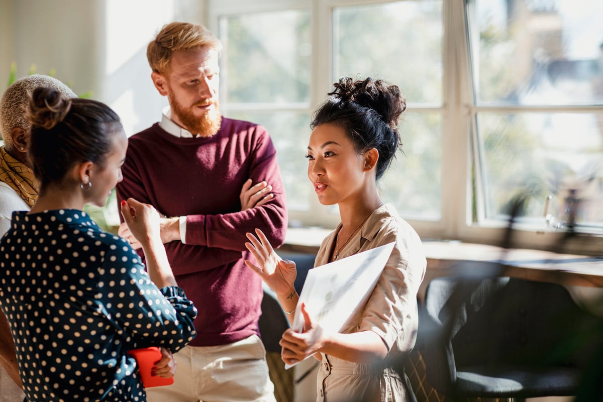 consultants discussing a client's business matters