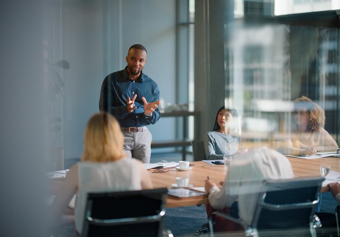 business manager leading a strategy meeting