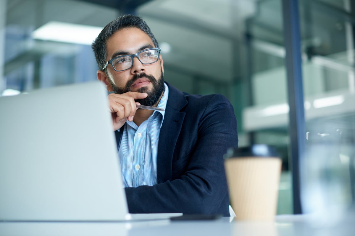 serious man at his work computer