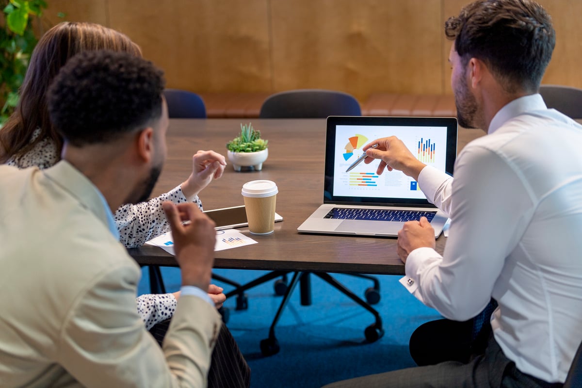 monitoring their businesses at a meeting