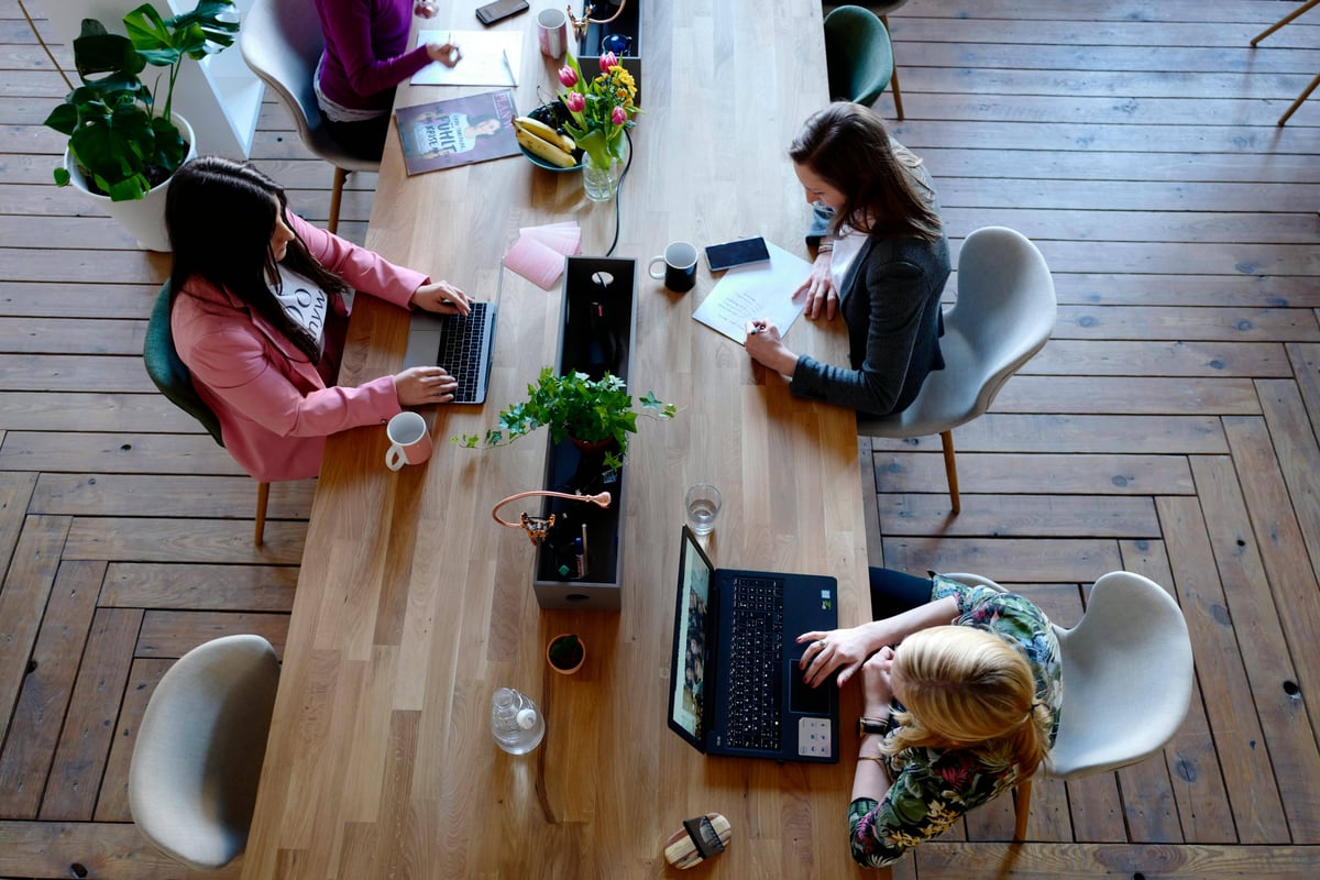 women working together at a co-working space