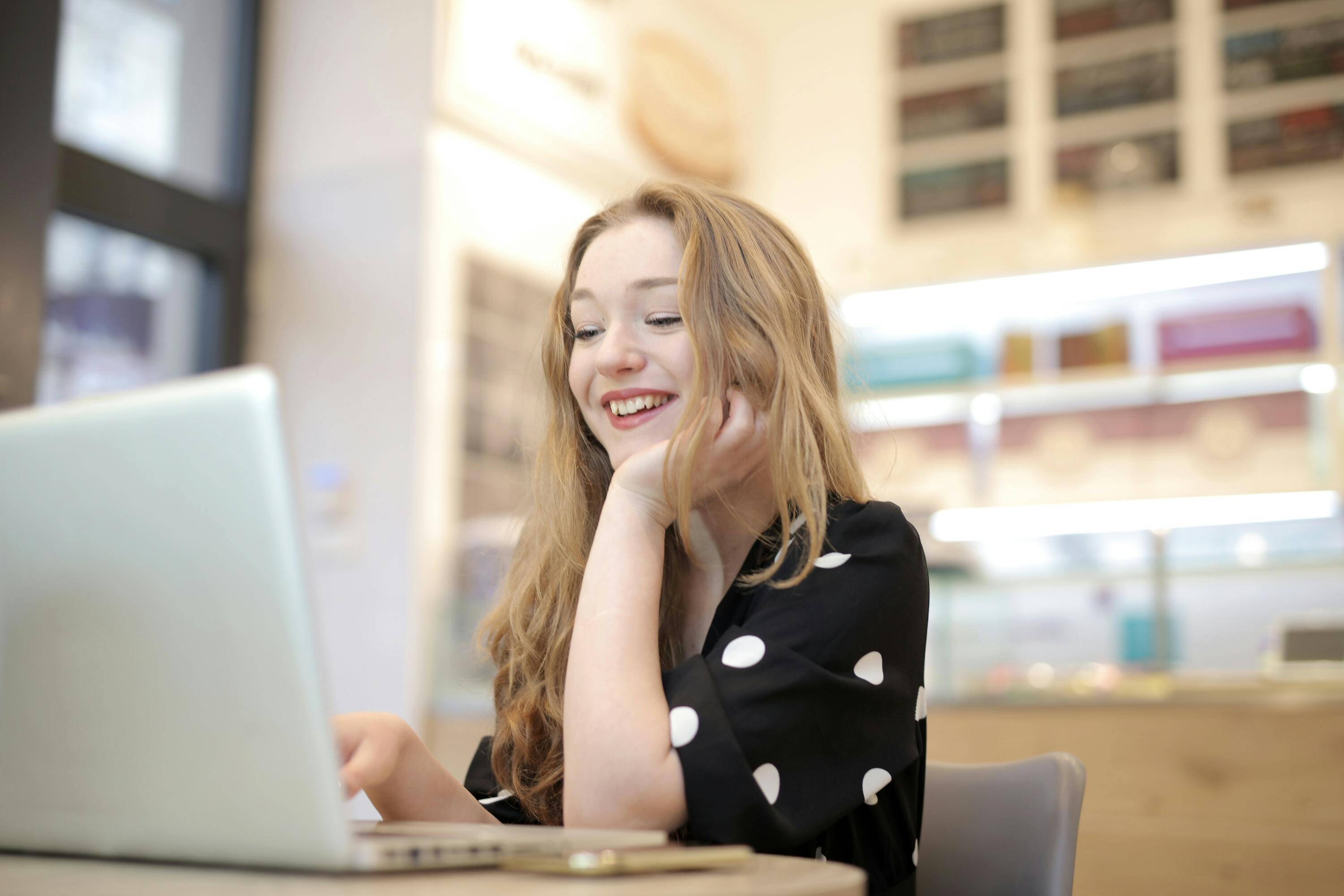 happy employee working at a computer