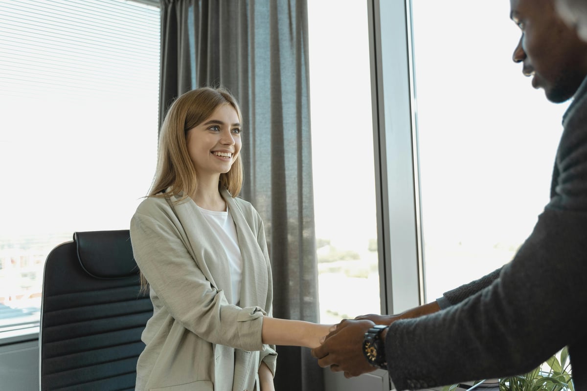 employee shaking hands in agreement