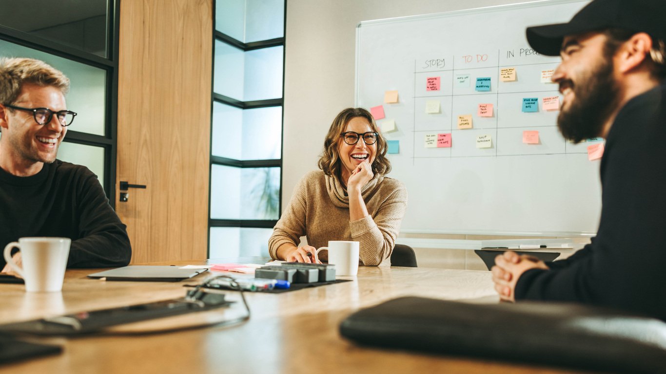 employees connected around a project