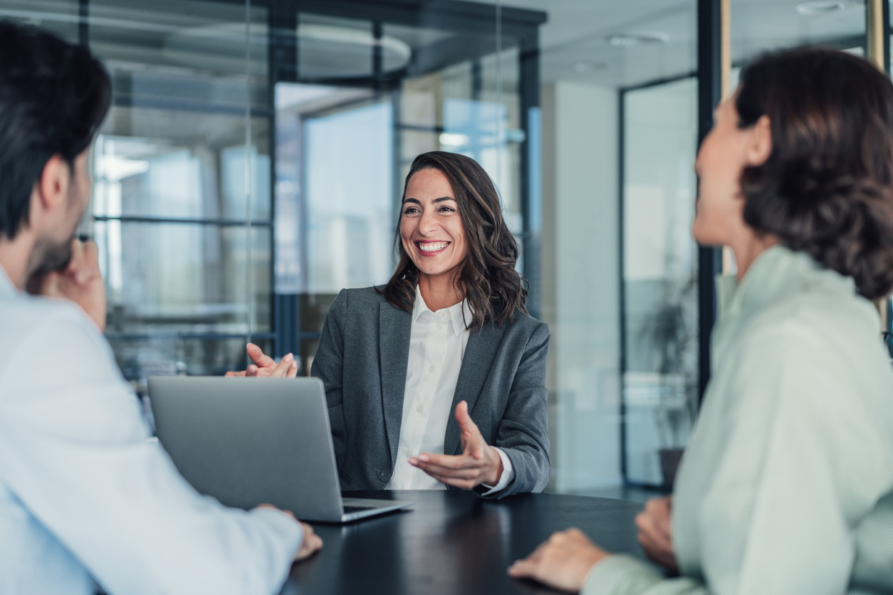 consultant discussing workforce data with clients